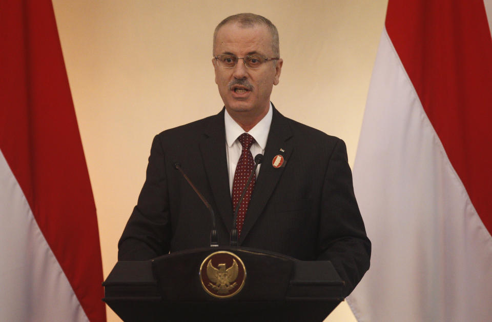 Palestinian Prime Minister Rami Hamdallah delivers his speech during the 2nd Conference on Cooperation among East Asian Countries for Palestinian Development (CEAPAD) in Jakarta, Indonesia, Saturday, March 1, 2014. (AP Photo/Achmad Ibrahim, Pool)