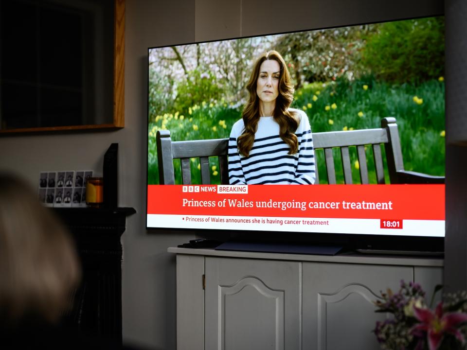 A relative of the Photographer watches television, as Catherine, The Princess of Wales announces that she is receiving a preventative course of chemotherapy for cancer on March 22, 2024 in London, England