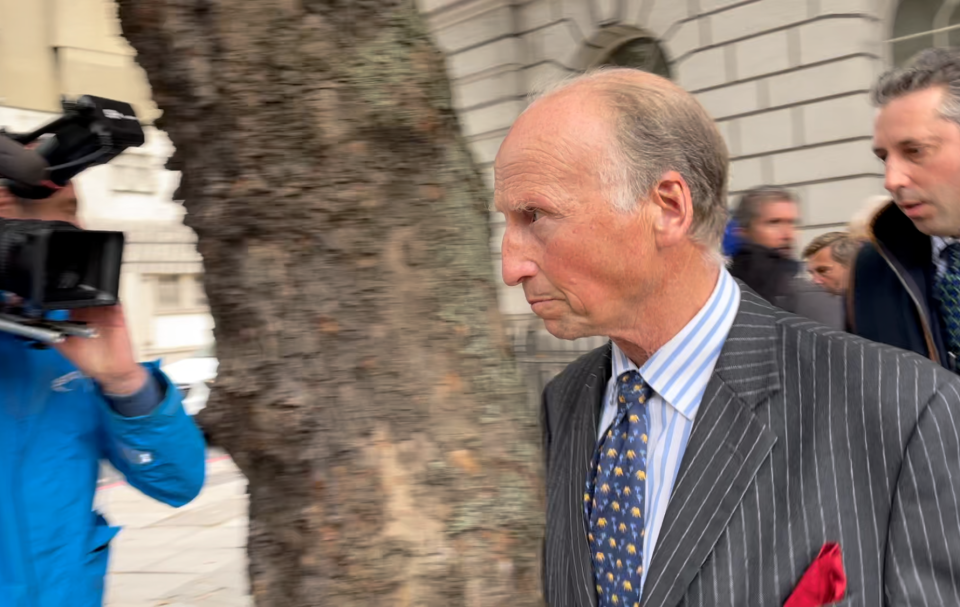 Mark Hankinson leaves Westminster Magistrates' Court with supporters as hunt saboteurs cheer (Laura Parnaby/PA).