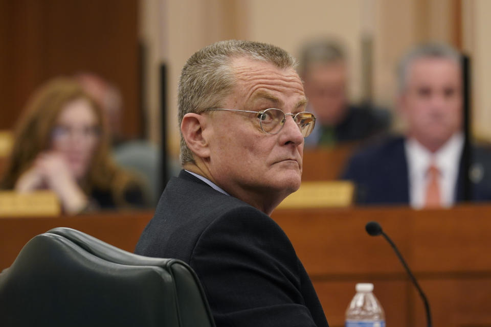 Bill Magness, President and CEO of the Electric Reliability Council of Texas (ERCOT), testifies as the Committees on State Affairs and Energy Resources hold a joint public hearing to consider the factors that led to statewide electrical blackouts, Thursday, Feb. 25, 2021, in Austin, Texas. The hearings were the first in Texas since a blackout that was one of the worst in U.S. history, leaving more than 4 million customers without power and heat in subfreezing temperatures. (AP Photo/Eric Gay)