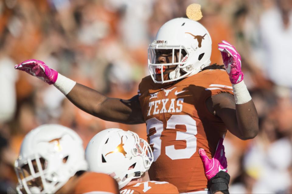 Texas RB D'Onta Foreman ran for 250 yards. (Getty)