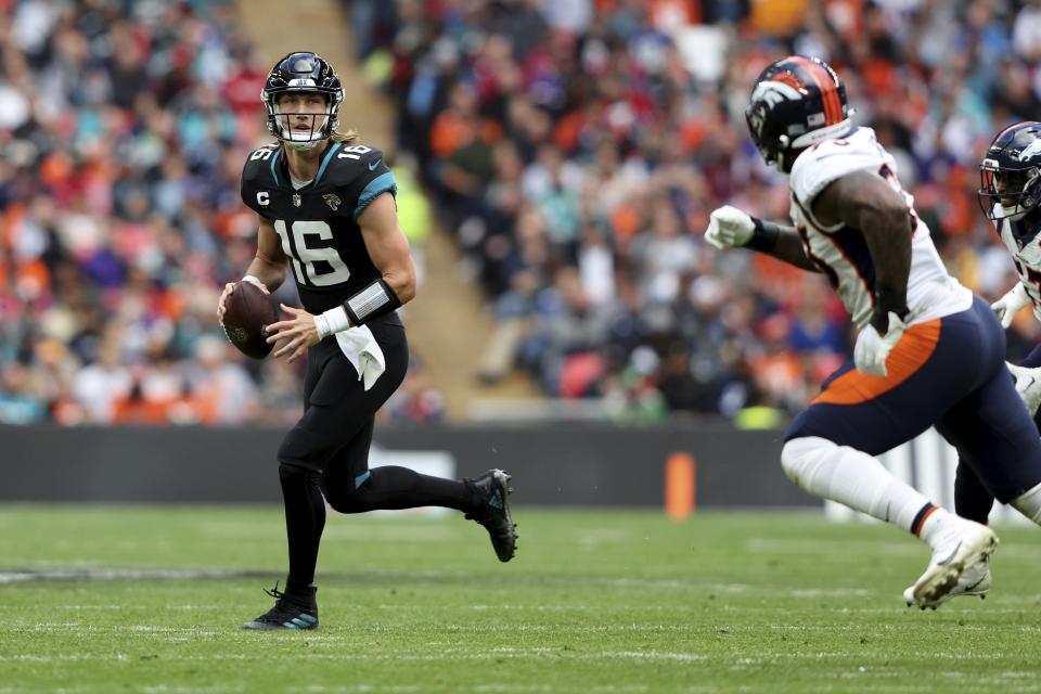 Jacksonville Jaguars quarterback Trevor Lawrence (16) during the NFL football game between Denver Broncos and Jacksonville Jaguars at Wembley Stadium in London, Sunday, Oct. 30, 2022. (AP Photo/Ian Walton)