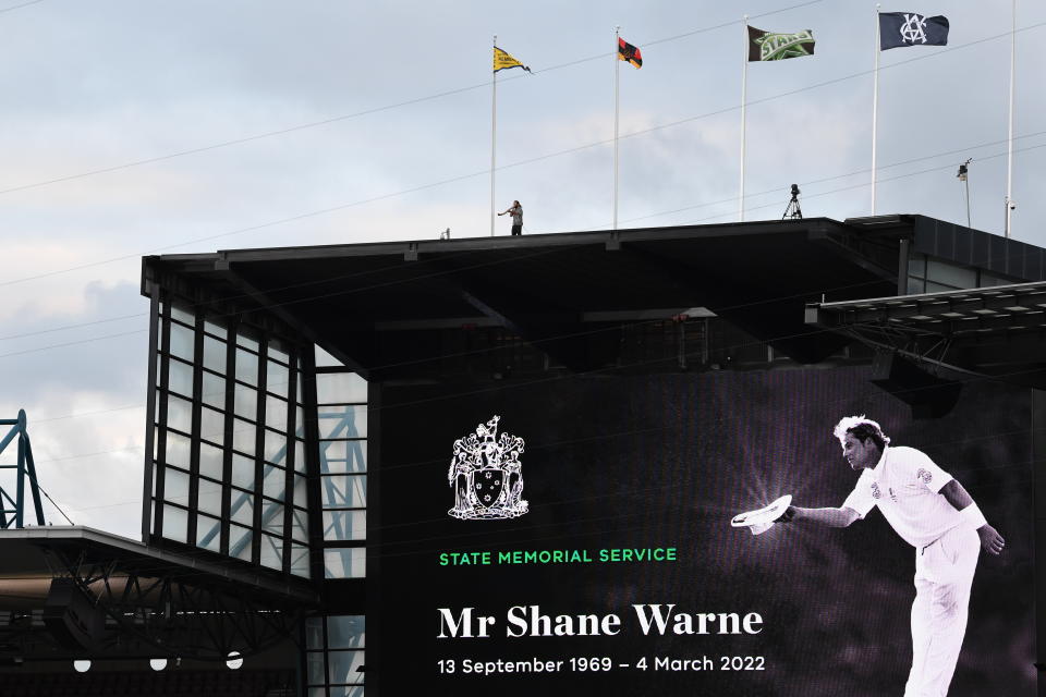 a photo of Shane Warne at his state funeral.