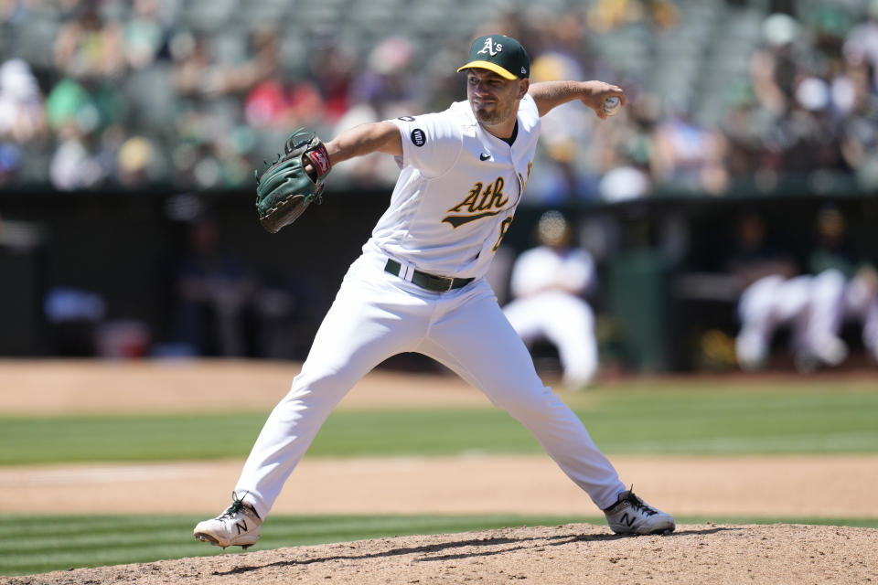 Oakland Athletics pitcher Sam Moll works against the Philadelphia Phillies during the sixth inning of a baseball game in Oakland, Calif., Saturday, June 17, 2023. (AP Photo/Jeff Chiu)