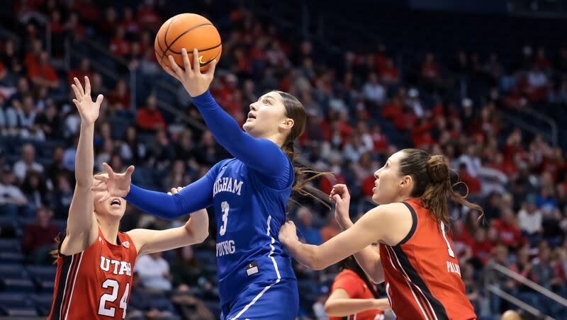 BYU Cougars guard Nani Falatea (3) goes to the hoop during a game against the Utah Utes at the Marriott Center in Provo on Saturday, Dec. 10, 2022.