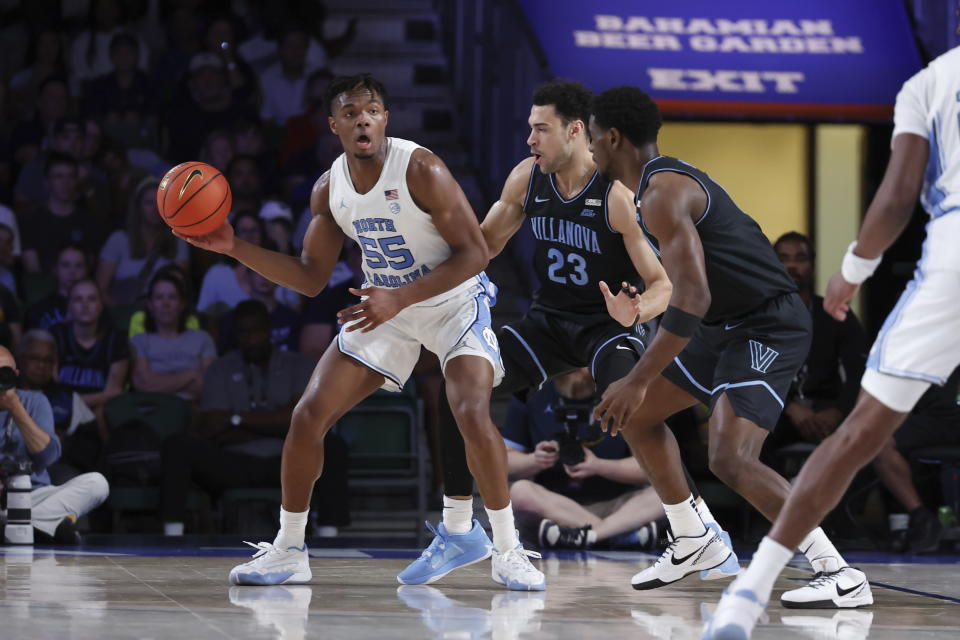 In this photo provided by Bahamas Visual Services, North Carolina's Harrison (55) Ingram looks to pass the ball during the first half of an NCAA college basketball game against Villanova in the Battle 4 Atlantis at Paradise Island, Bahamas, Thursday, Nov. 23, 2023. (Tim Aylen/Bahamas Visual Services via AP)