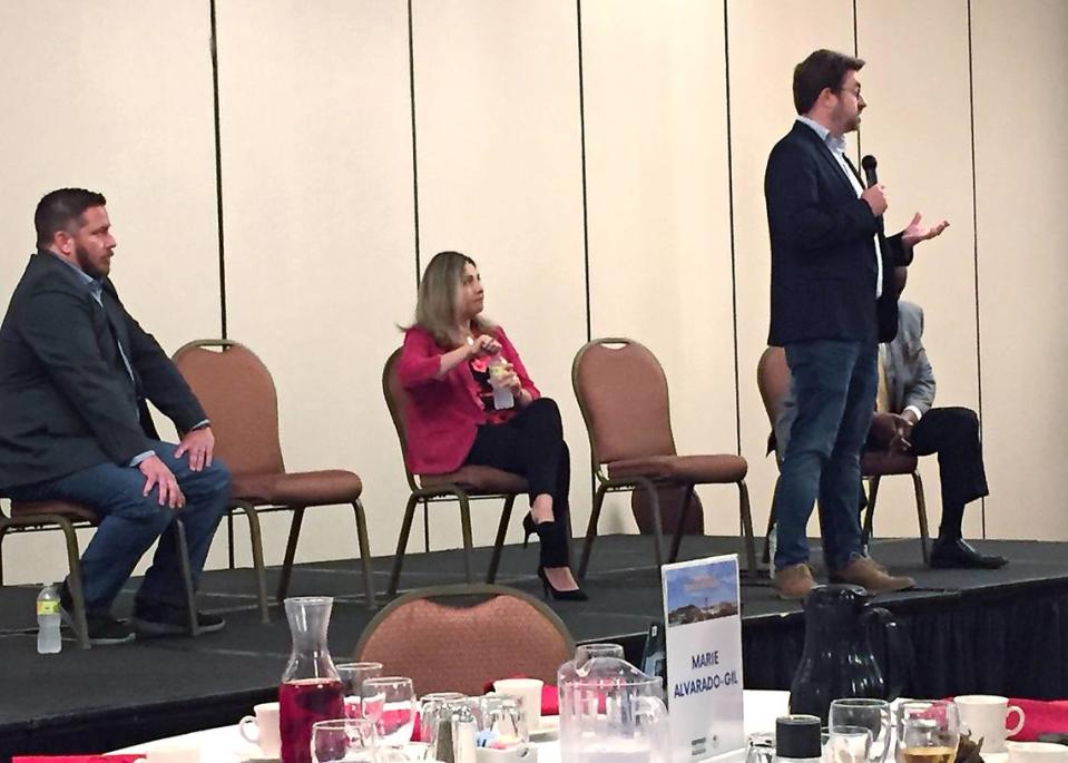 State Senate candidate Tim Robertson speaks at Modesto election forum. Also pictured is senate candidate Marie Alvarado-Gil and Juan Alanis, who’s running for state Assembly.