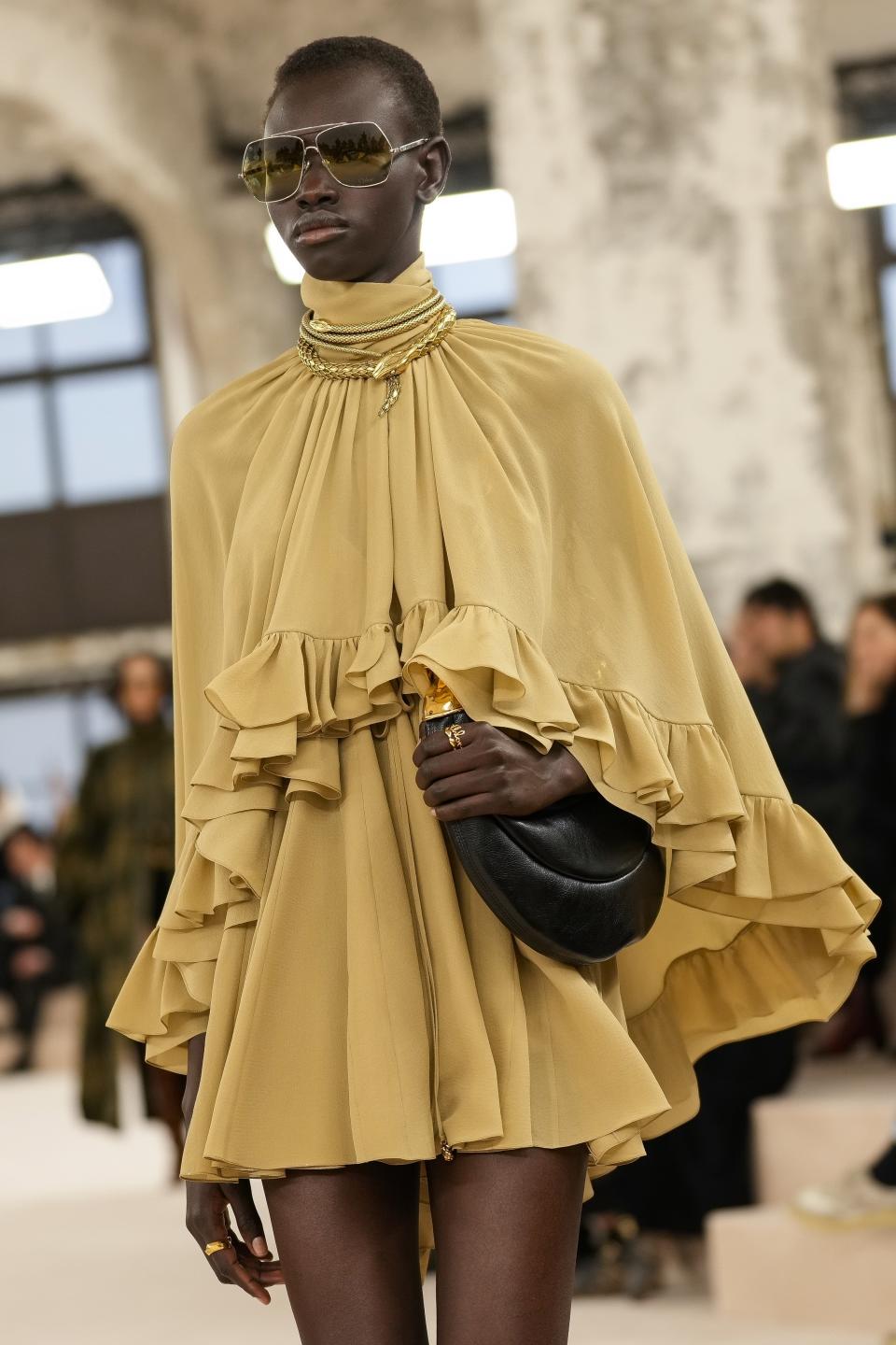 A model wears a creation as part of the Chloe Fall/Winter 2024-2025 ready-to-wear collection presented Thursday, Feb. 29, 2024 in Paris. (Photo by Scott A Garfitt/Invision/AP)