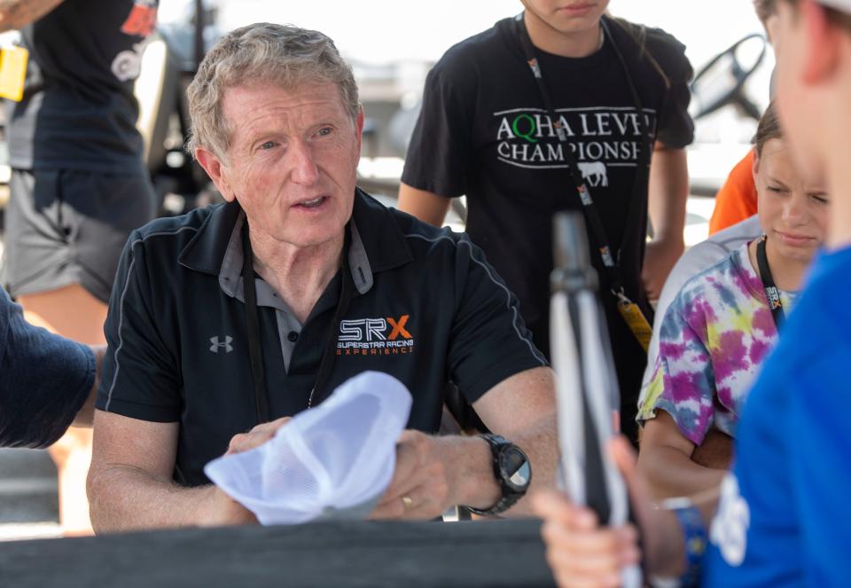 Bill Elliott signs autographs during the SRX Superstar Racing Experience at 5 Flags Speedway Saturday, June 18, 2022.