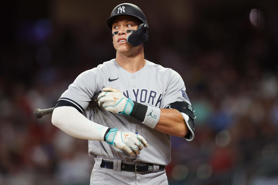 Yankees slugger Aaron Judge watches the flight of a foul ball against the Braves in the ninth inning at Truist Park in Atlanta on Aug. 16, 2023.