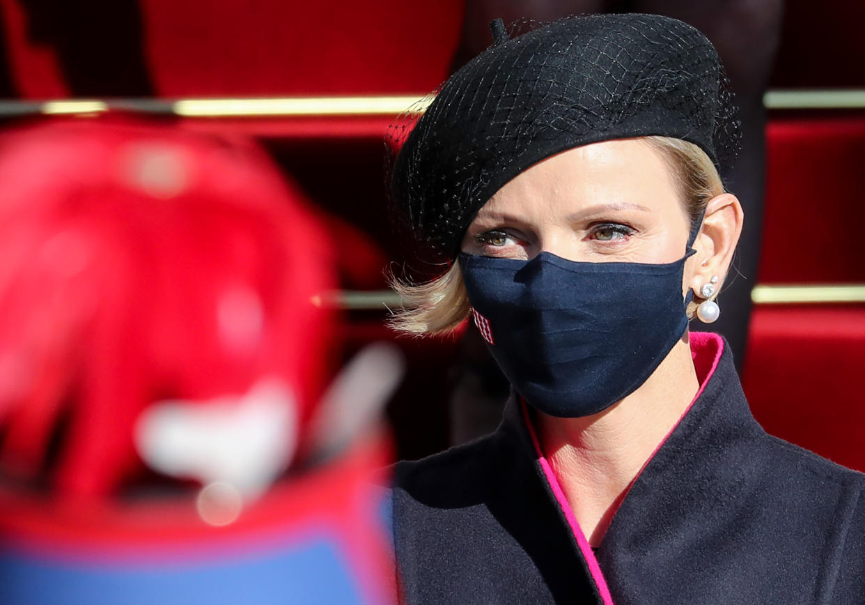 Princess Charlene of Monaco, wearing a face mask, leaves after attending a mass during the celebrations marking Monaco's National Day at the Cathedral of Monaco in Monaco, on November 19, 2020. (Photo by Valery HACHE / AFP) (Photo by VALERY HACHE/AFP via Getty Images)