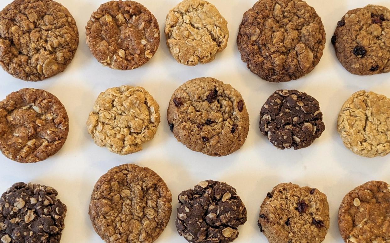 <span>‘Chocolate Anzacs? Almond Anzacs? Anzacs with sour fruits? I tried them all’: a selection of Kate Waldegrave's Anzac biscuits, baked from seven different recipes over two days</span><span>Photograph: Kate Waldegrave</span>