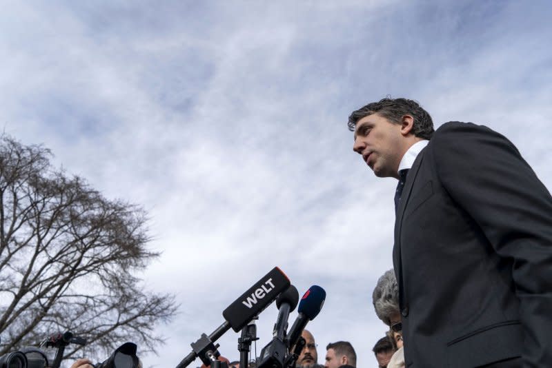 Attorney Jason Murray, who represents voters seeking to remove Trump from the ballot, speaks to the media outside the U.S. Supreme Court in Washington on Thursday. Photo by Bonnie Cash/UPI