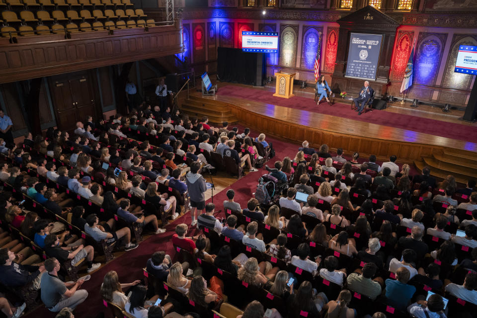 Republican presidential candidate and former Vice President Mike Pence, front right, speaks, next to AP National Politics Reporter Meg Kinnard, left, moderating, Tuesday, Oct. 3, 2023, as students ask questions during an Associated Press 2024 GOP Presidential Candidates Conversations on National Security and Foreign Policy event, held in partnership with Georgetown University's Institute of Politics and Public Service, at Georgetown University in Washington. (AP Photo/Jacquelyn Martin)