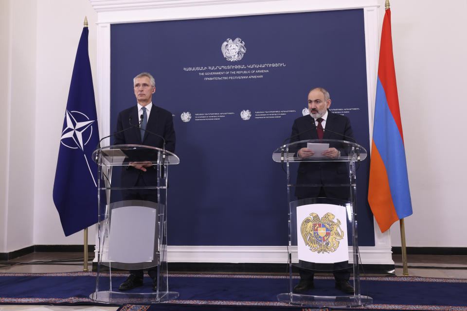 Armenia's Prime Minister Nikol Pashinyan, right, and NATO Secretary General Jens Stoltenberg make a joint statements after their meeting in Yerevan, Armenia, Tuesday, March 19, 2024. (Stepan Poghosyan/Photolure via AP)