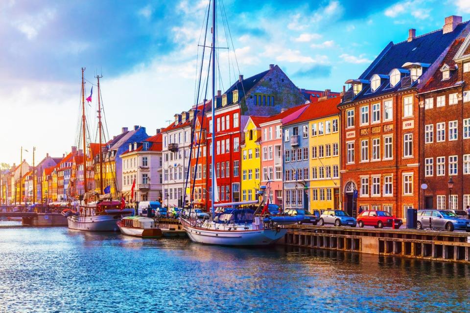 The pastels of Nyhavn are the perfect backdrop to a city break for two (Getty Images/iStockphoto)