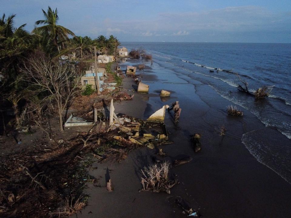 shorelines of homes crumbling into the sea