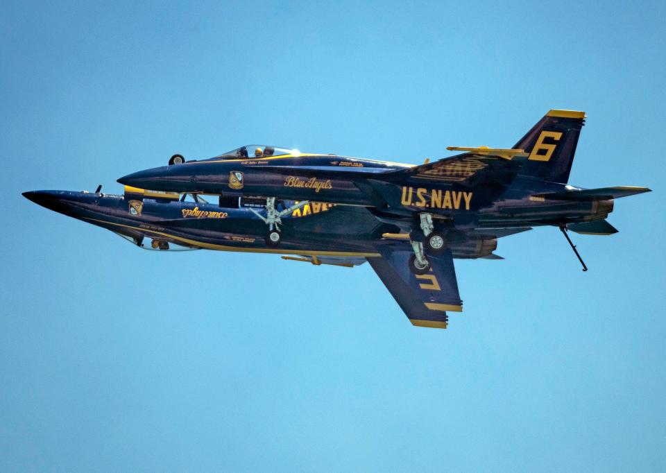 HI-REZ--The U.S. Navy flight demonstration squadron, The Blue Angels, hone their flying skills during a practice session over Pensacola Beach on Thursday, July 7, 2022. 