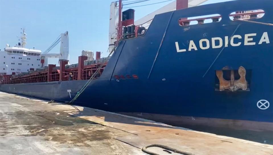 This image from video provided on Friday, July 29, 2022, shows the cargo ship Laodicea docked at a seaport in Tripoli, Lebanon. Lebanese officials rejected protests from Ukraine that the ship was carrying 10,000 metric tons of grain stolen by Russia.