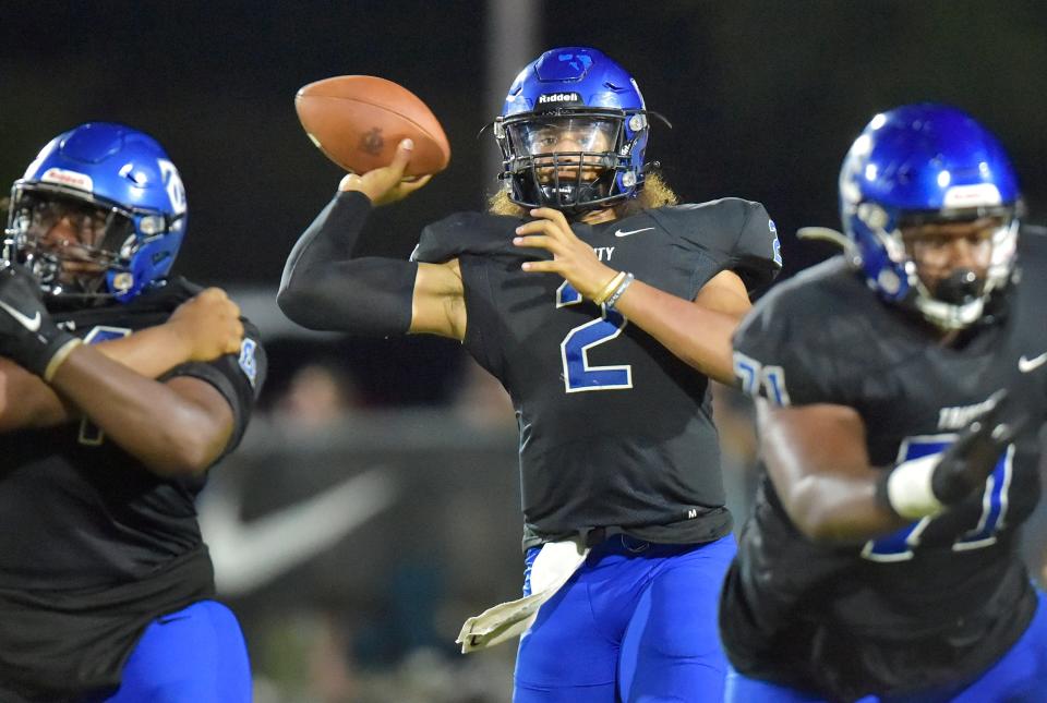 Trinity Christian quarterback Colin Hurley targets a receiver. The Conquerors face Orlando Christian Prep Friday.