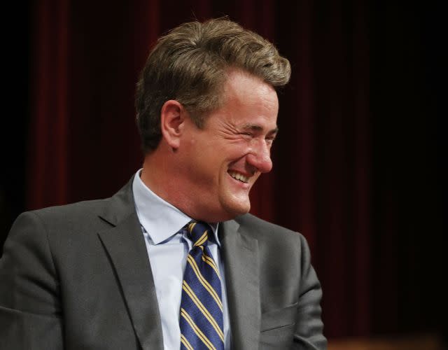 WASHINGTON, DC – JULY 12: MSNBC ‘Morning Joe’ host Joe Scarborough reacts during an interview with his co-host Mika Brzezinski and philanthropist and financier David Rubenstein during a Harvard Kennedy School Institute of Politics event in the McGowan Theater at the National Archives July 12, 2017 in Washington, DC. Scarborough and Brzezinski, who are engaged to be married, were recently attacked by President Donald Trump on Twitter, where he called the hosts ‘Psycho Joe’ and ‘low I.Q. Crazy Mika,’ among other personal insults. (Photo by Chip Somodevilla/Getty Images)<br>