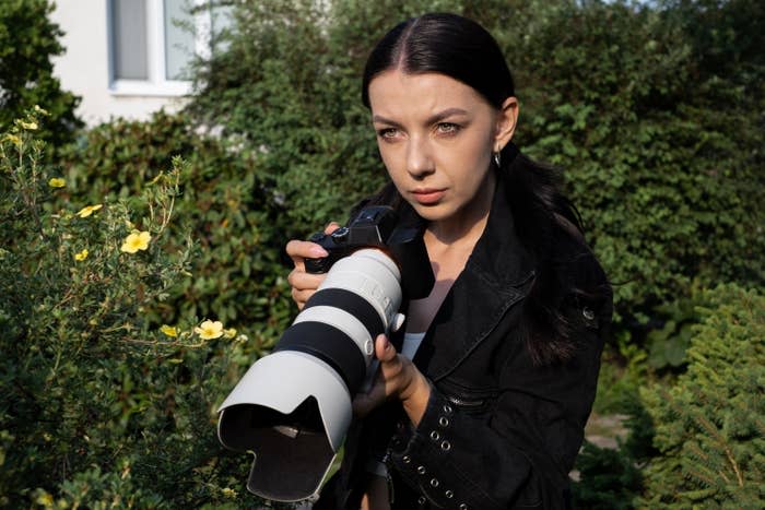 A woman with a camera