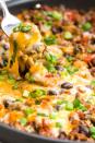 <p>Everything you love in beef tacos, only without the tortillas.</p><p>Get the recipe from <a href="https://www.delish.com/cooking/recipe-ideas/recipes/a45831/best-taco-skillet-recipe/" rel="nofollow noopener" target="_blank" data-ylk="slk:Delish;elm:context_link;itc:0;sec:content-canvas" class="link ">Delish</a>. </p>