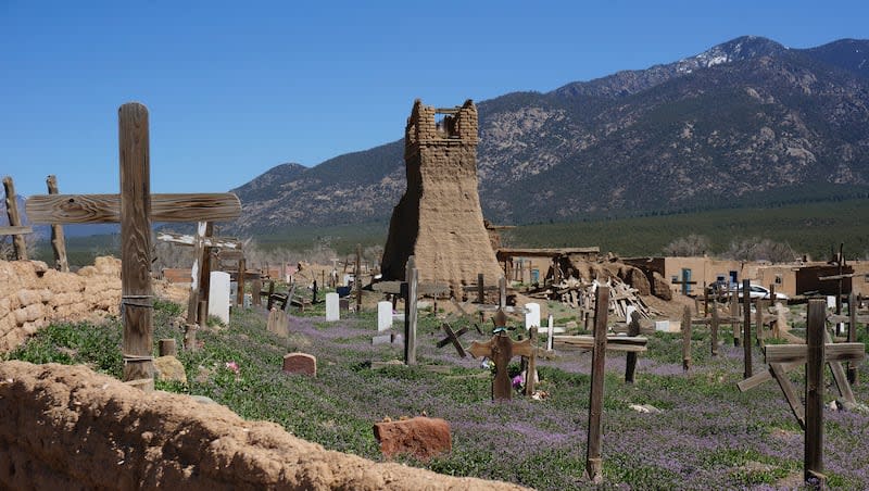 The Taos Pueblo Cemetery with original San Geronimo Church in the background in Taos, N.M., on Sunday, April 16, 2023. Taos Pueblo is the only living Native American community designated both a World Heritage Site by UNESCO and a National Historic Landmark.