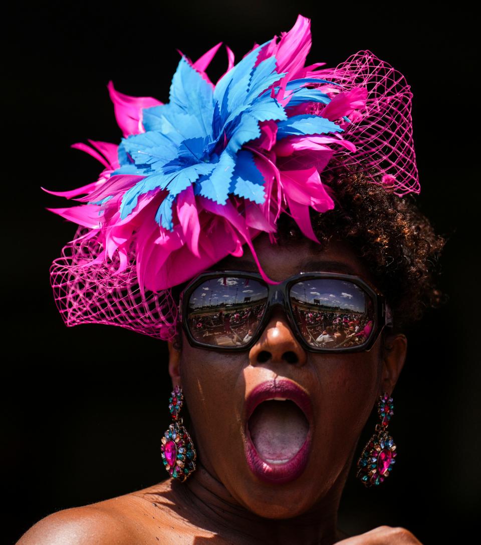 Colorful hats were the fashion for many on Thurby, The Louisville area's day at the races at Churchill Downs Thursday May 4, 2023, in Louisville, Ky.