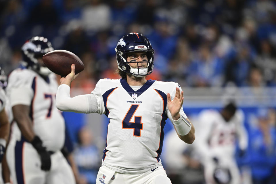 Denver Broncos quarterback Jarrett Stidham throws during warmups of an NFL football game against the Detroit Lions, Saturday, Dec. 16, 2023, in Detroit. (AP Photo/David Dermer)