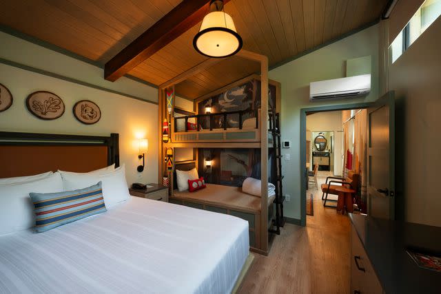 <p>Courtesy Walt Disney World Resorts</p> The bedroom at The Cabins at Disney's Fort Wilderness.