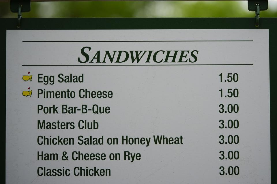 The prices for sandwiches are posted on a sign during a practice round in preparation for the Masters golf tournament at Augusta National Golf Club Tuesday, April 9, 2024, in Augusta, Ga. (AP Photo/Matt Slocum)