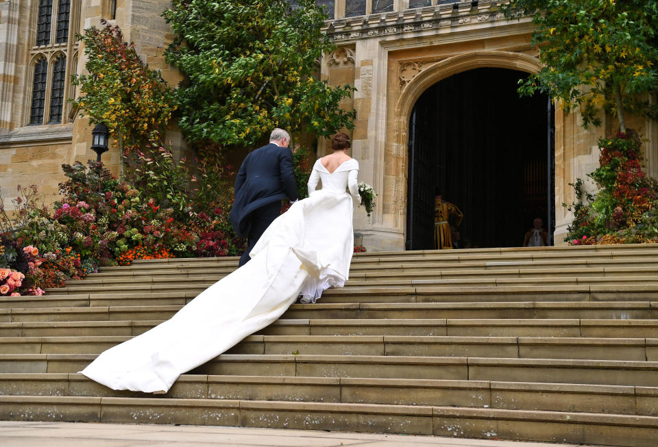 Prince Andrew and Princess Eugenie ascend the stairs together.&nbsp;