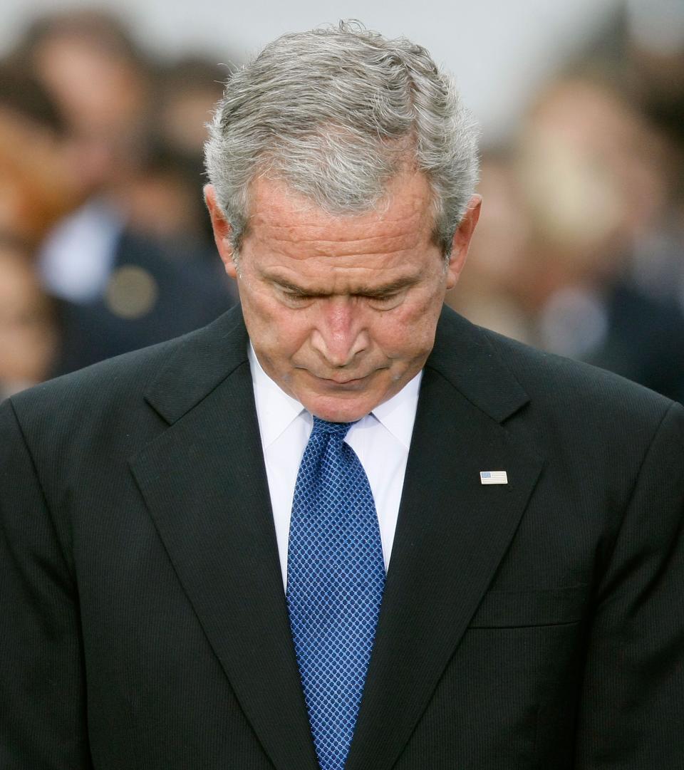 WASHINGTON - SEPTEMBER 11: (FILE PHOTO) U.S. President George W. Bush bows his head during a moment of silence on the South Lawn of the White House, September 11, 2007 in Washington, DC. Today marks the sixth anniversary of the September 11, 2001 terror attacks, when terrorists high jacked airliners and flew them in the World Trade Center and the Pentagon. (Photo by Mark Wilson/Getty Images) On Wednesday, July 6, 2011 Former US President George W Bush Celebrates His 65th Birthday Please refer to the following profile on Getty Images Archival for further imagery. http://www.gettyimages.co.uk/Search/Search.aspx?EventId=96780293&EditorialProduct=Archival