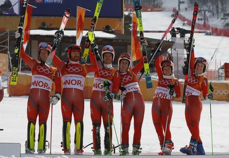 Alpine Skiing - Pyeongchang 2018 Winter Olympics - Team Event - Yongpyong Alpine Centre - Pyeongchang, South Korea - February 24, 2018 - Bronze medallist Norway's team celebrates on the podium. REUTERS/Leonhard Foeger