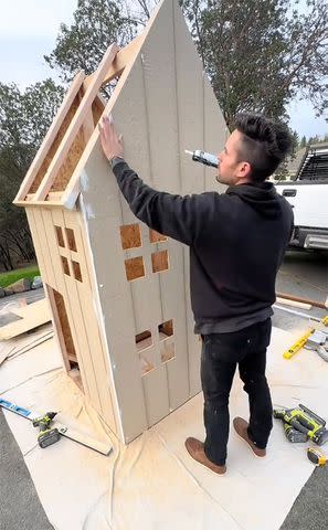 <p>Mason Smith/TikTok</p> Mason Smith builds daughter Peppa Pig house replica