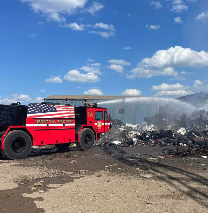 Henry Volunteer Fire Department using water to put out flames and hot spots at recycling center. (Photo Courtesy: Franklin County Department of Public Safety)