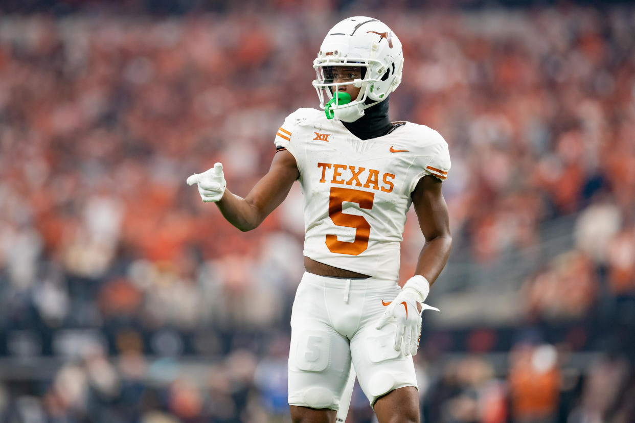 ARLINGTON, TX - DECEMBER 02: Texas Longhorns wide receiver Adonai Mitchell (5) points during the Big 12 Championship game between the Texas Longhorns and the Oklahoma State Cowboys   on December 02, 2023 at AT&T Stadium in Arlington, TX. (Photo by Chris Leduc/Icon Sportswire via Getty Images)