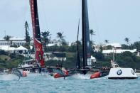 Sailing - America's Cup finals - Hamilton, Bermuda - June 24, 2017 - Emirates Team New Zealand and Oracle Team USA round a mark in race six of America's Cup finals. REUTERS/Mike Segar