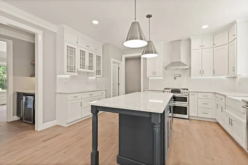 This house at 2 Cooper Lane in Easton sold for $1,400,000 on Feb. 16. 2024.The home's kitchen features a lwalk-in pantry, pot filler, center island and coffee bar.
