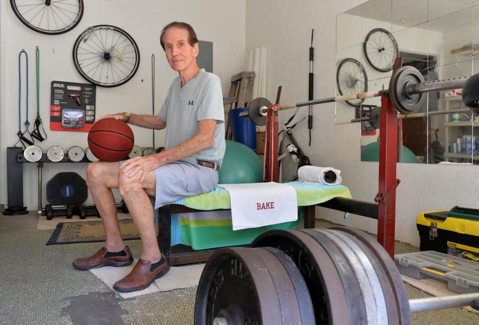 Long-time Sarasota basketball coach Kerry Baker created a gym in his garage to help his players train.