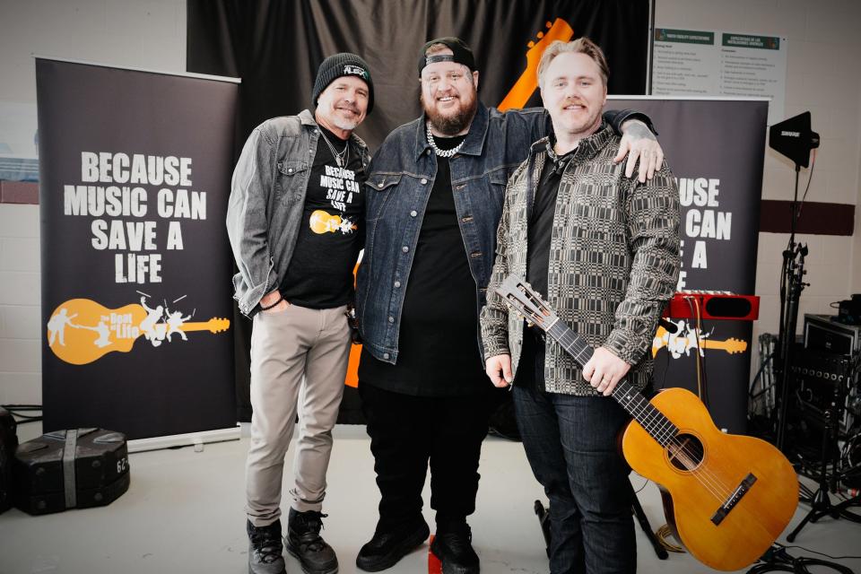 Jelly Roll is flanked by performers Jeffrey Steele and ERNEST at the launch of his singer-songwriter studio program based at the Davidson County Juvenile Detention Center.