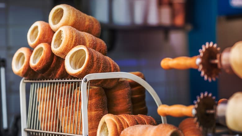 Freshly prepared trdelnik on a rack