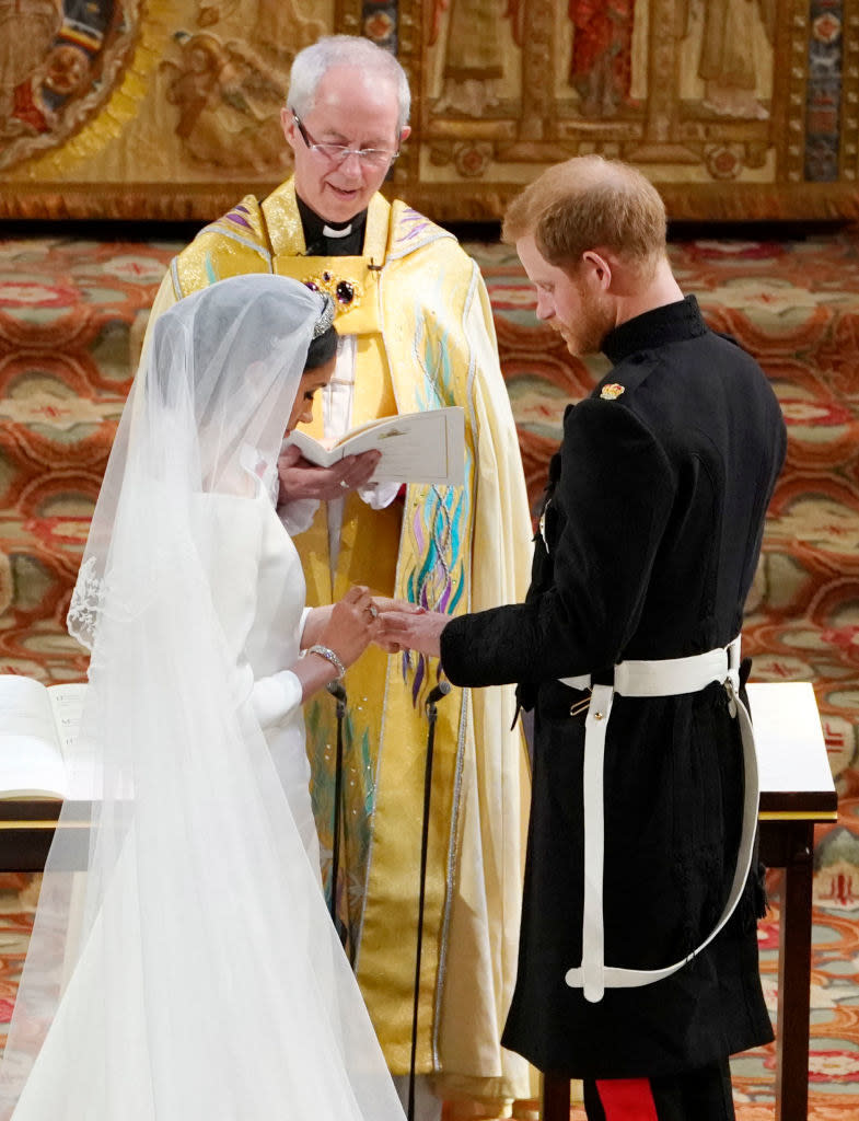 Meghan Markle and Prince Harry exchanging rings