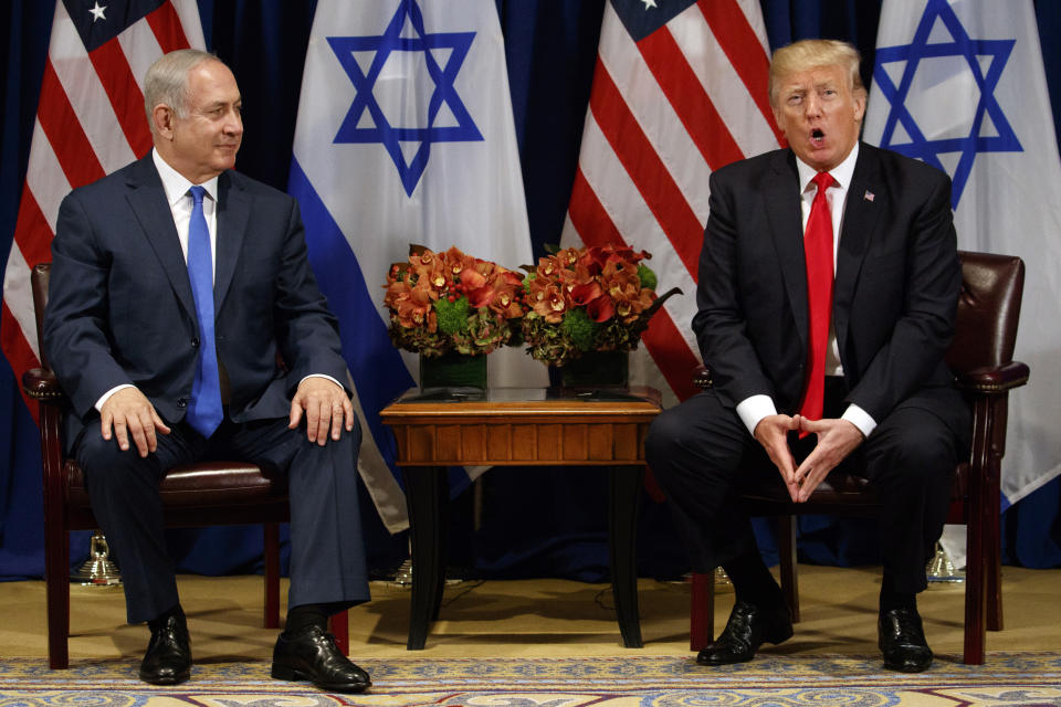 FILE - In this Sept. 18, 2017, file photo, President Donald Trump speaks during a meeting with Israeli Prime Minister Benjamin Netanyahu at the Palace Hotel during the United Nations General Assembly. Netanyahu’s recent troubles have some parallels to those of his good friend Trump. Both face an array of corruption allegations, both have lashed out at the media and investigators, and both suffered major setbacks this week at the hands of career government officials. (AP Photo/Evan Vucci, File)