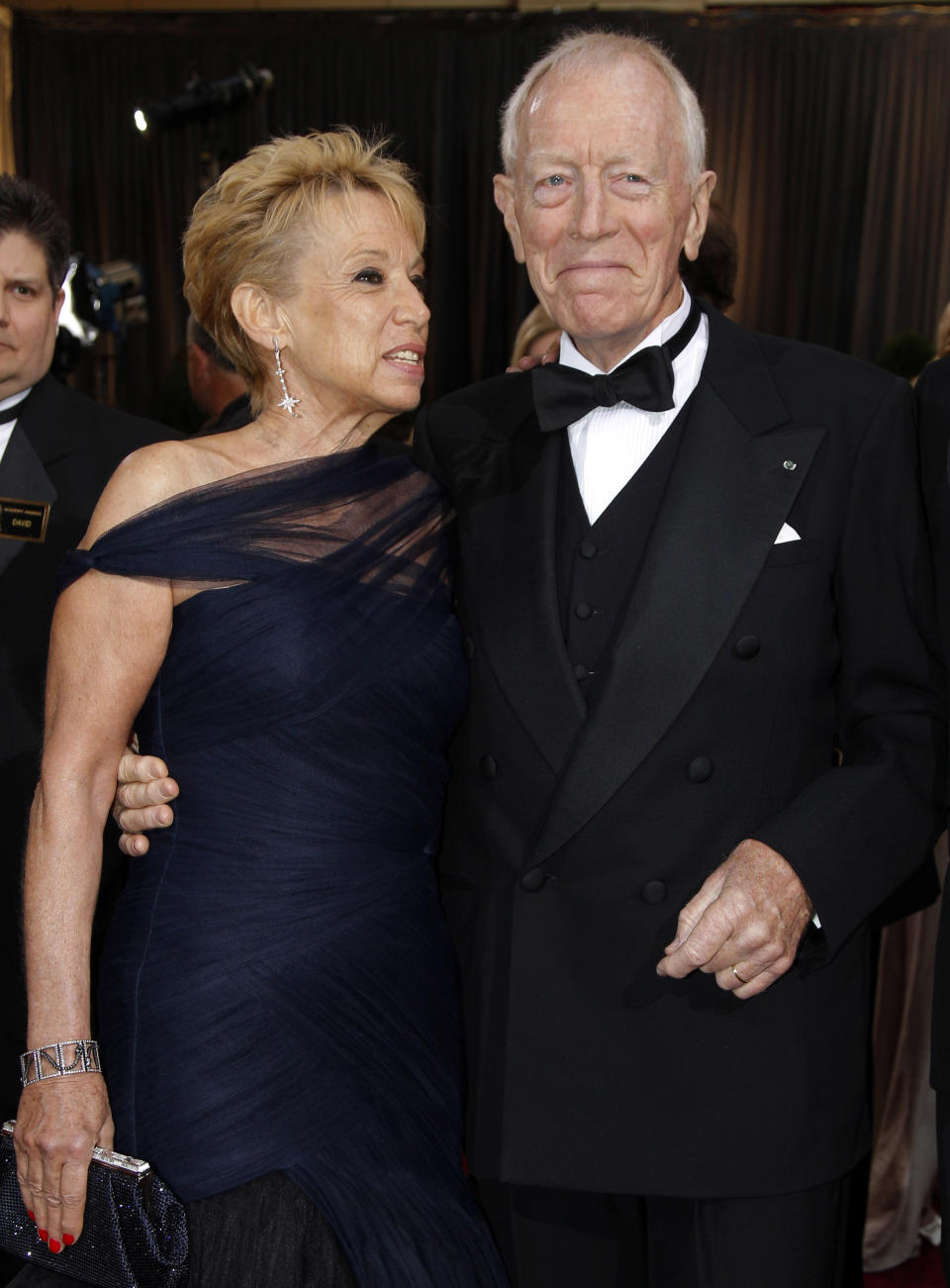 Max von Sydow, right, and Catherine Brelet arrive before the 84th Academy Awards on Sunday, Feb. 26, 2012, in the Hollywood section of Los Angeles. (AP Photo/Amy Sancetta)