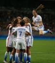 <p>Women’s Olympic Football team celebrate a goal during a group G match of the women’s Olympic football tournament between United States and France at the Mineirao stadium in Belo Horizonte, Brazil, Saturday, Aug. 6, 2016. (AP Photo/Eugenio Savio) </p>