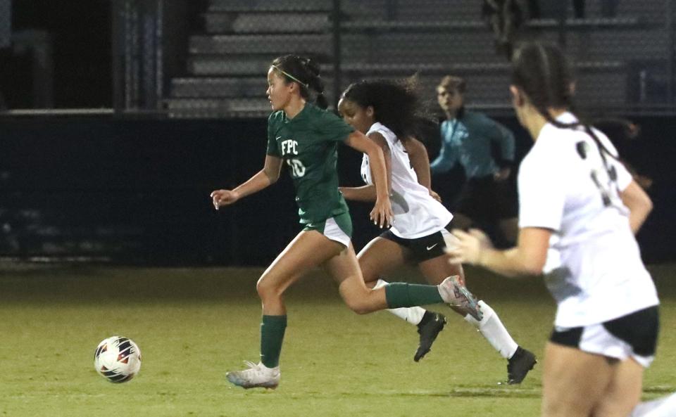 Flagler Palm Coast High's Ivy Chen #10 works down field as Seminole players give chase, Friday January 26, 2024 in District 2-7A girls semifinals at Daytona State College