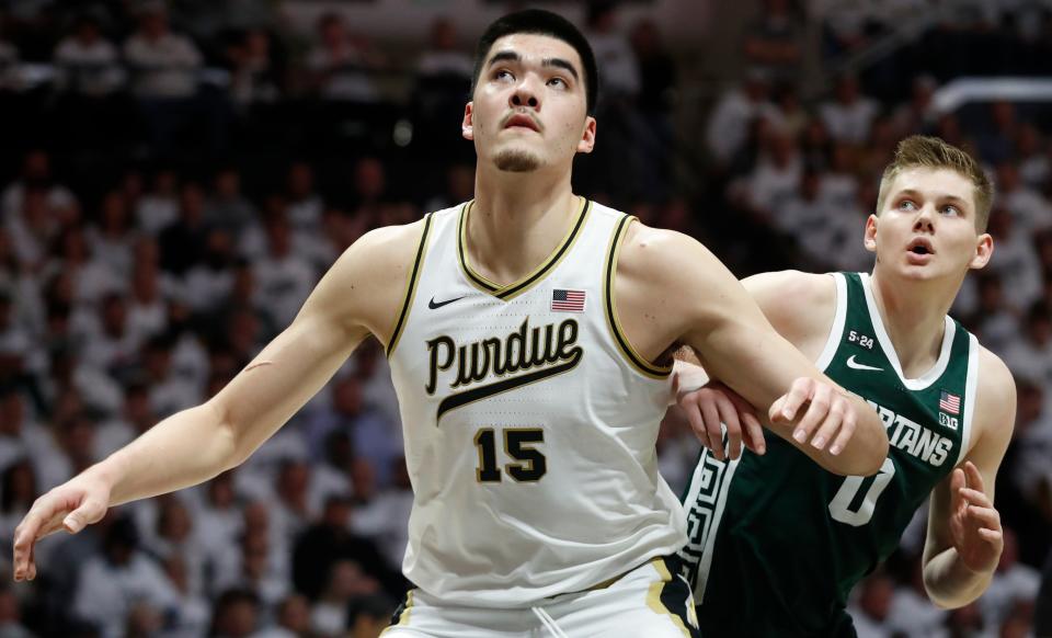 Purdue Boilermakers center Zach Edey (15) boxes out Michigan State Spartans forward Jaxon Kohler (0) during the NCAA men’s basketball game, Sunday, Jan. 29, 2023, at Mackey Arena in West Lafayette, Ind.