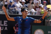 Chile's Alejandro Tabilo celebrates after winning a match agains Serbia's Novak Djokovic at the Italian Open tennis tournament in Rome, Sunday, May 12, 2024. (AP Photo/Alessandra Tarantino)